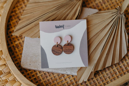 round pink polymer clay earrings with round wooden pendant