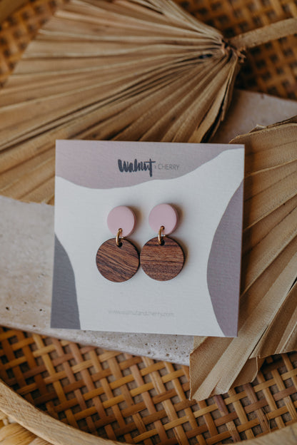 round pink polymer clay earrings with round wooden pendant