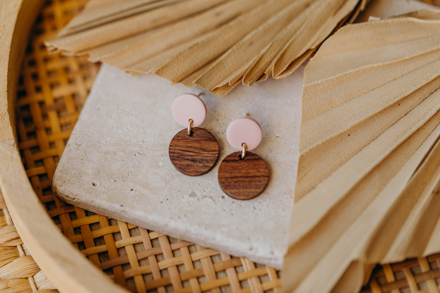 round pink polymer clay earrings with round wooden pendant