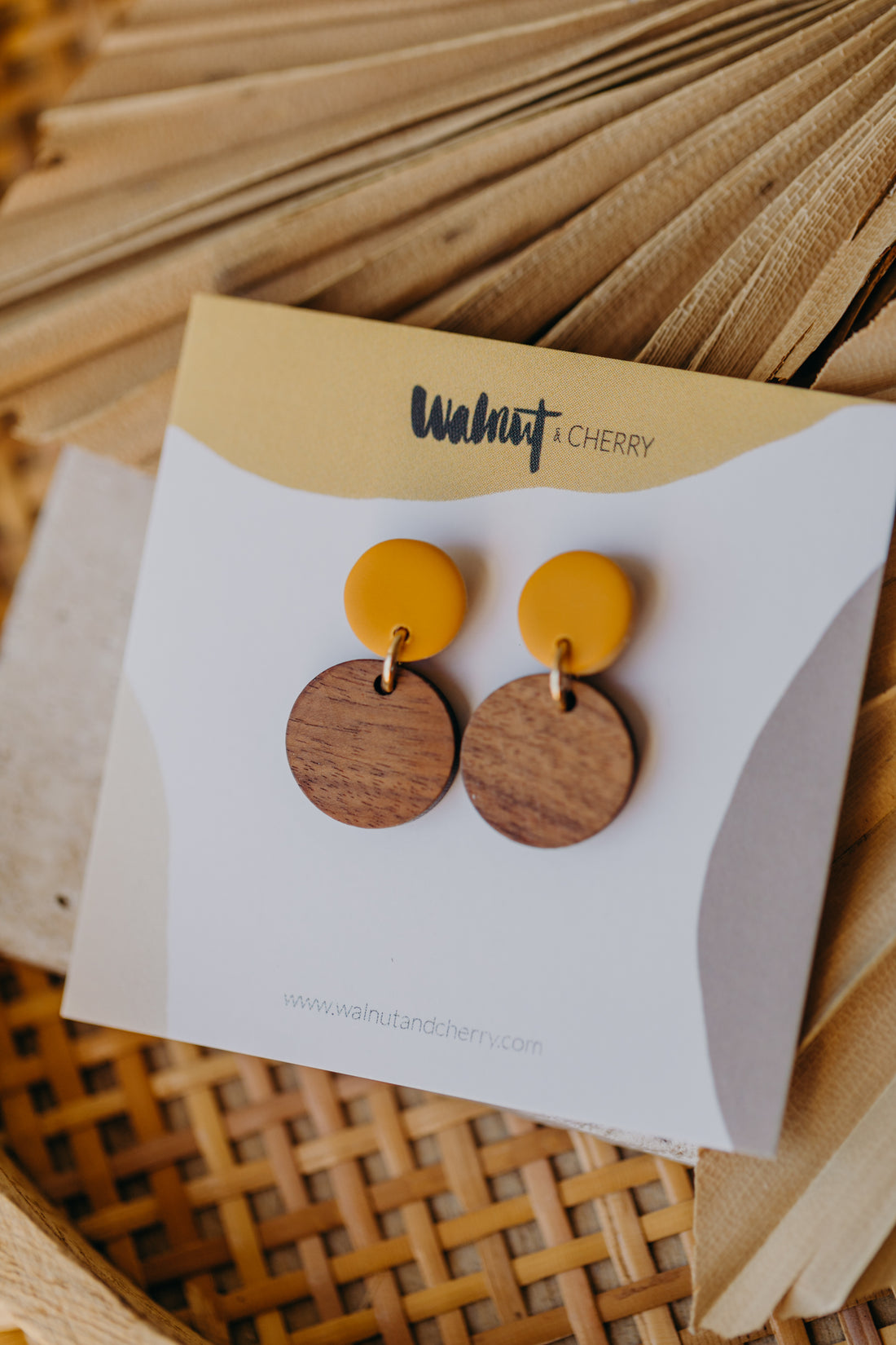 mustard yellow round polymer clay earrings with round wooden pendant