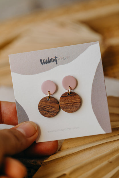 round pink polymer clay earrings with round wooden pendant