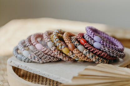 KKNEKKI hair tie set of 4 in shades of grey, green and black