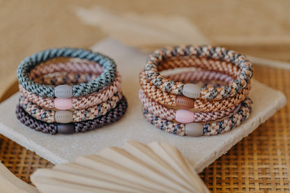 KKNEKKI hair tie set of 4 in shades of grey, green and black