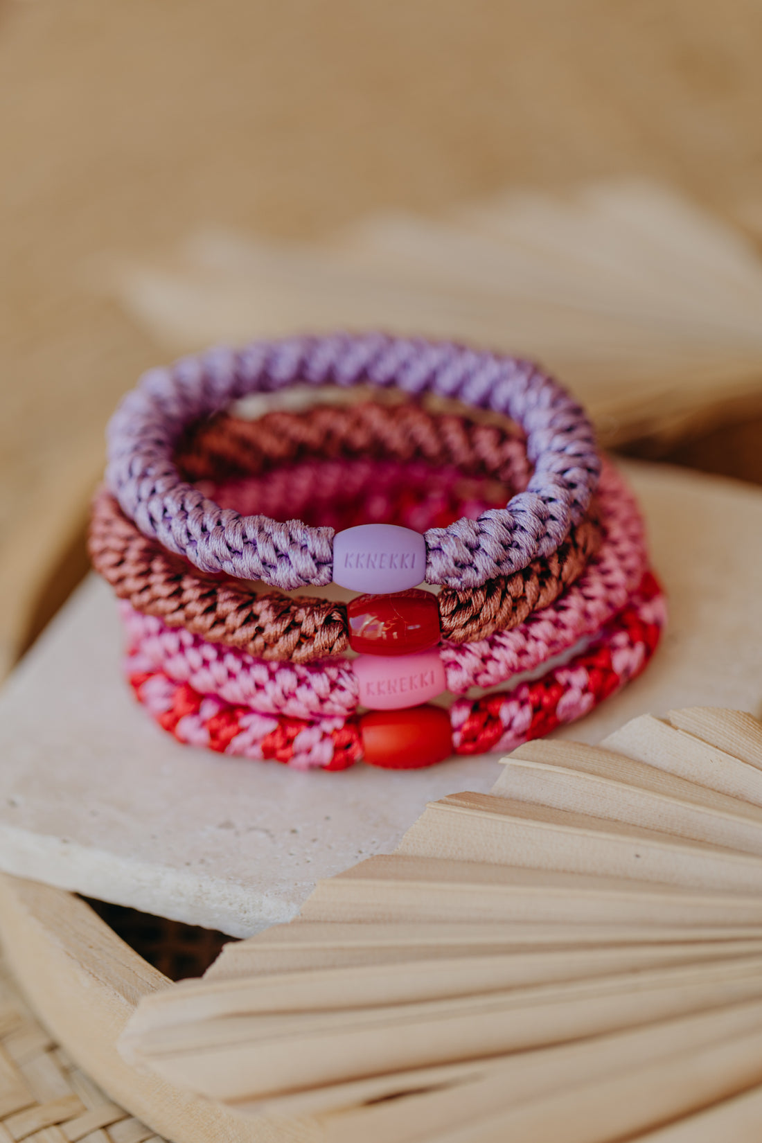 KKNEKKI hair tie set of 4 in shades of grey, green and black