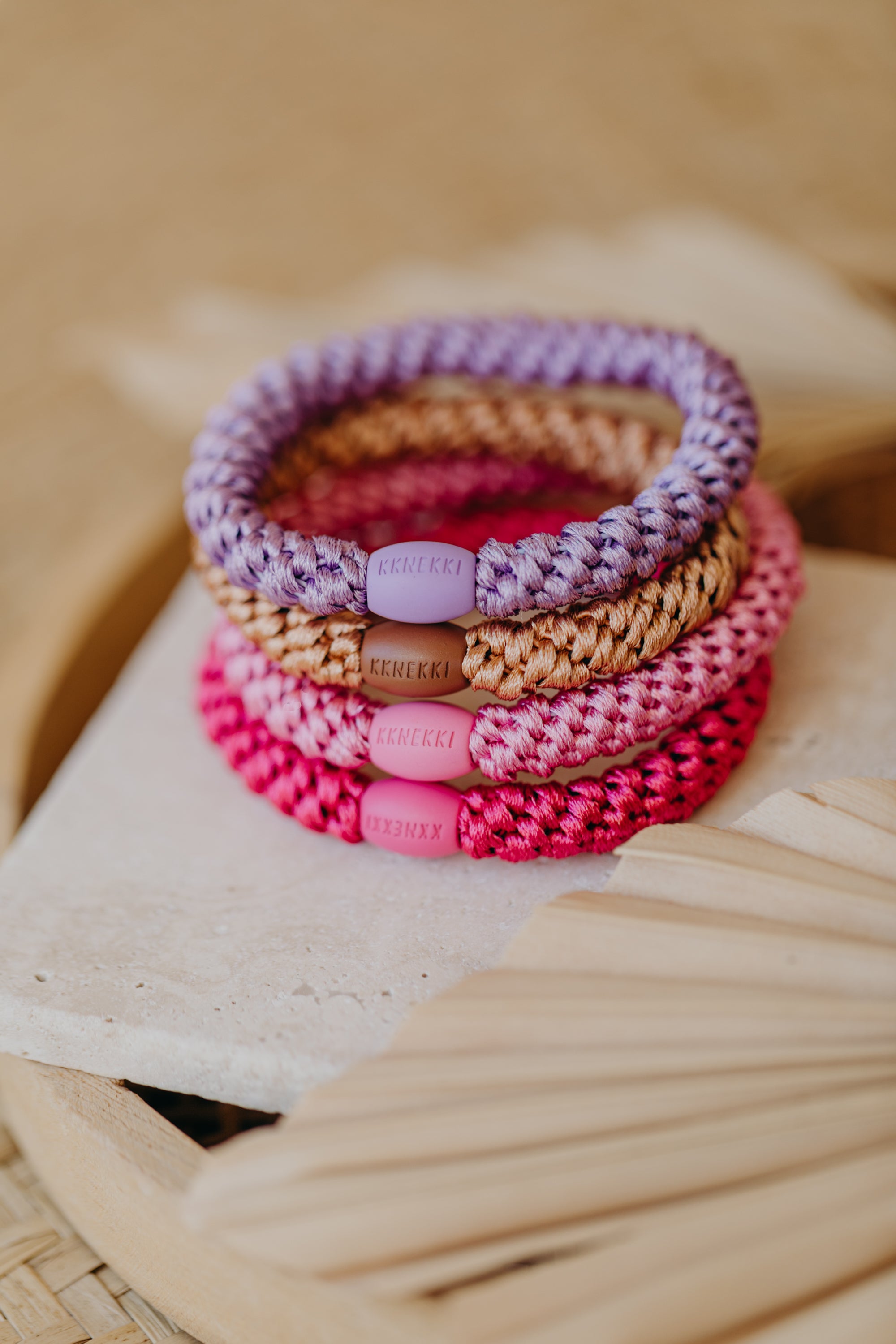 KKNEKKI hair tie set of 4 in shades of grey, green and black