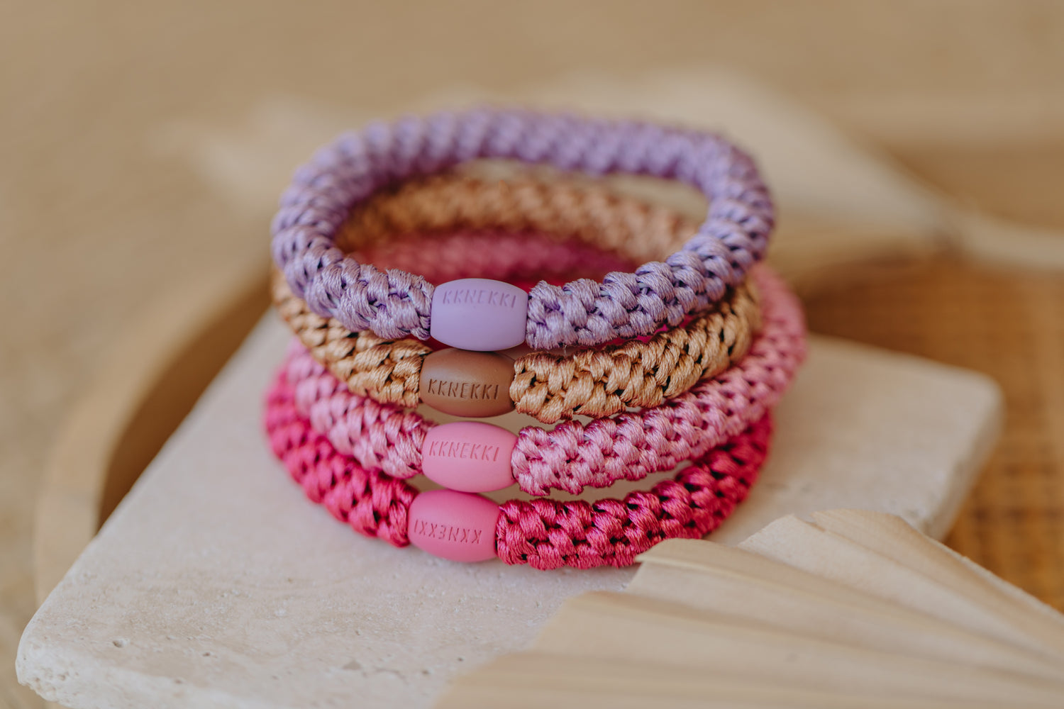 KKNEKKI hair tie set of 4 in shades of grey, green and black