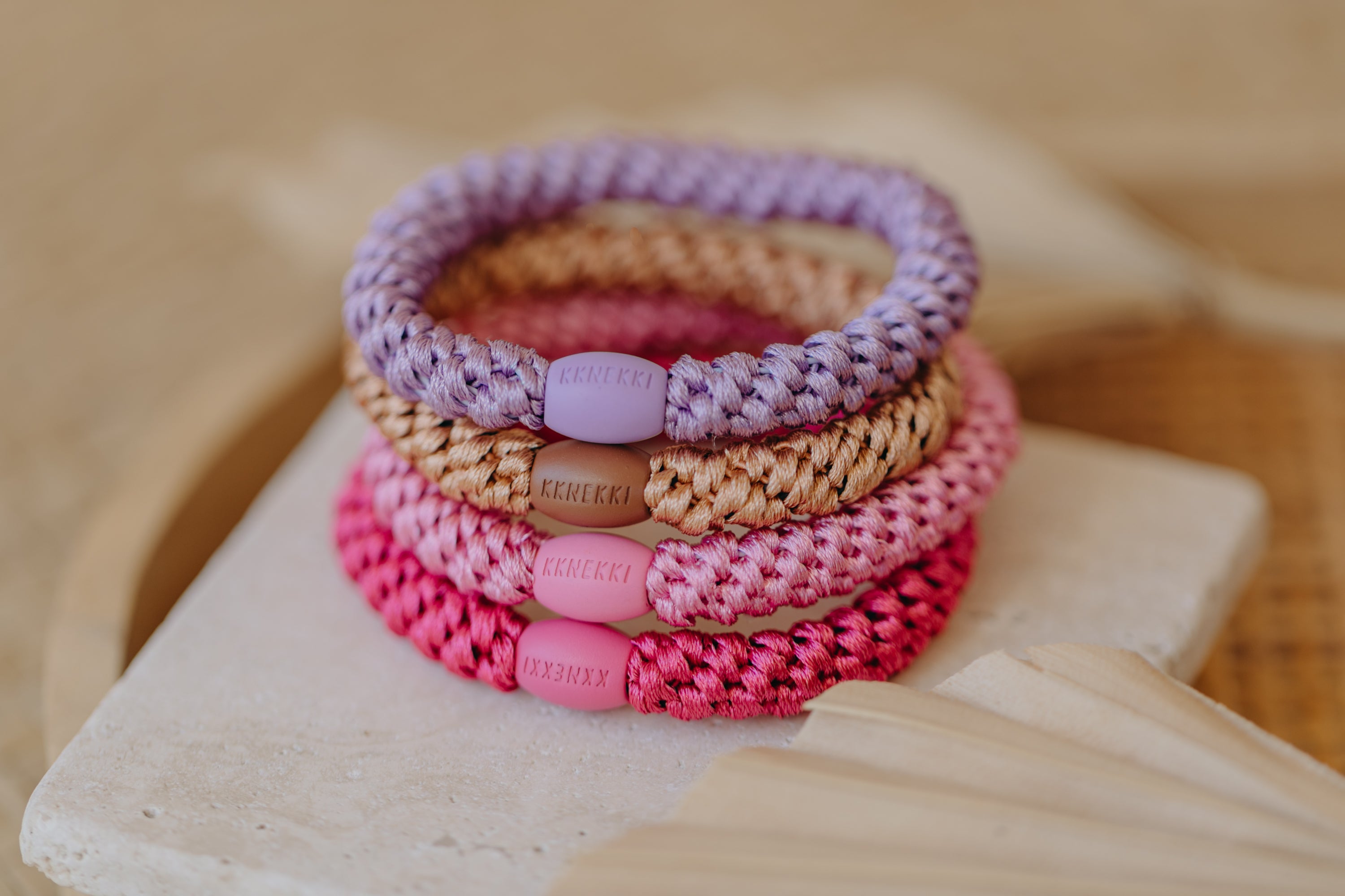 KKNEKKI hair tie set of 4 in shades of grey, green and black