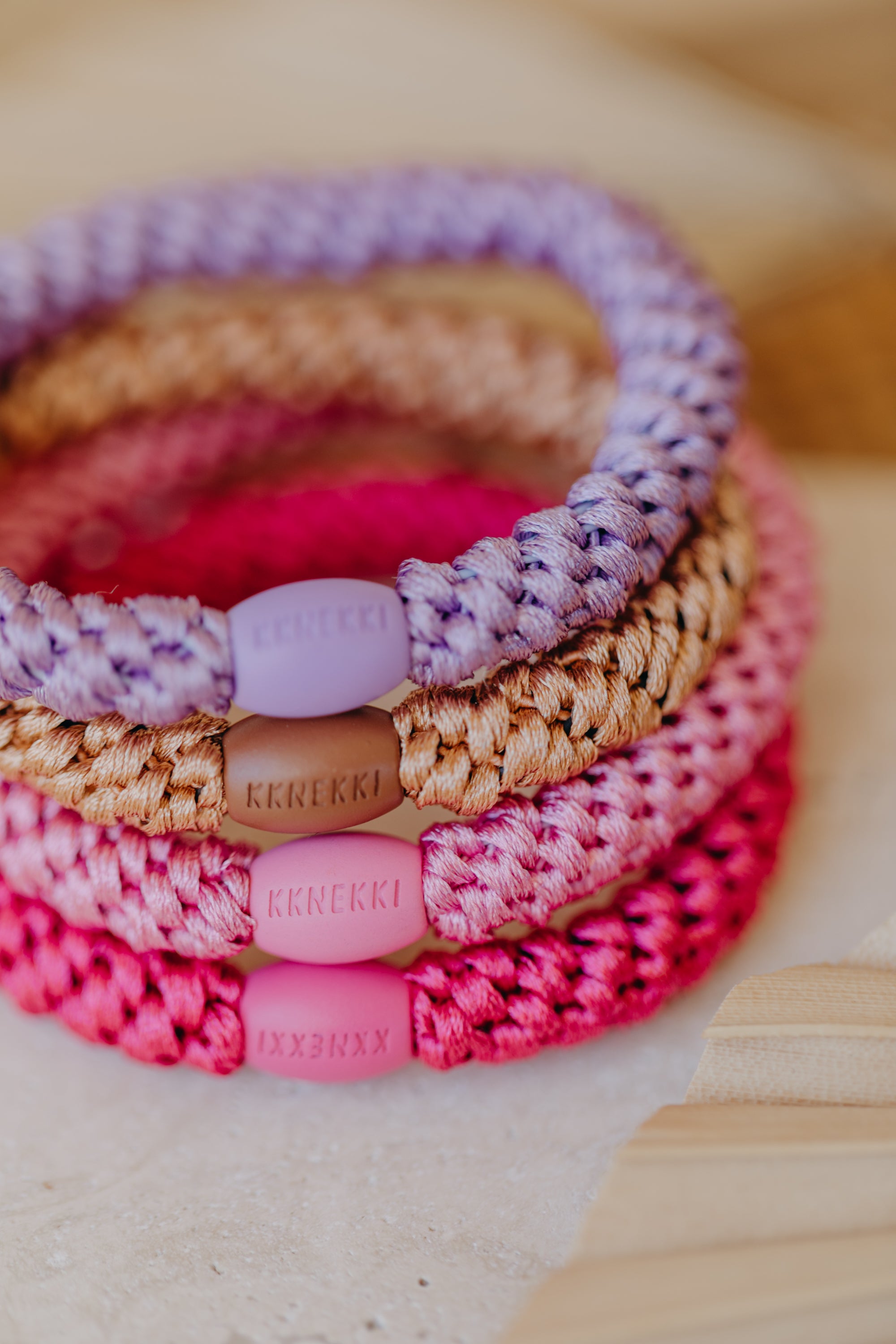 KKNEKKI hair tie set of 4 in shades of grey, green and black