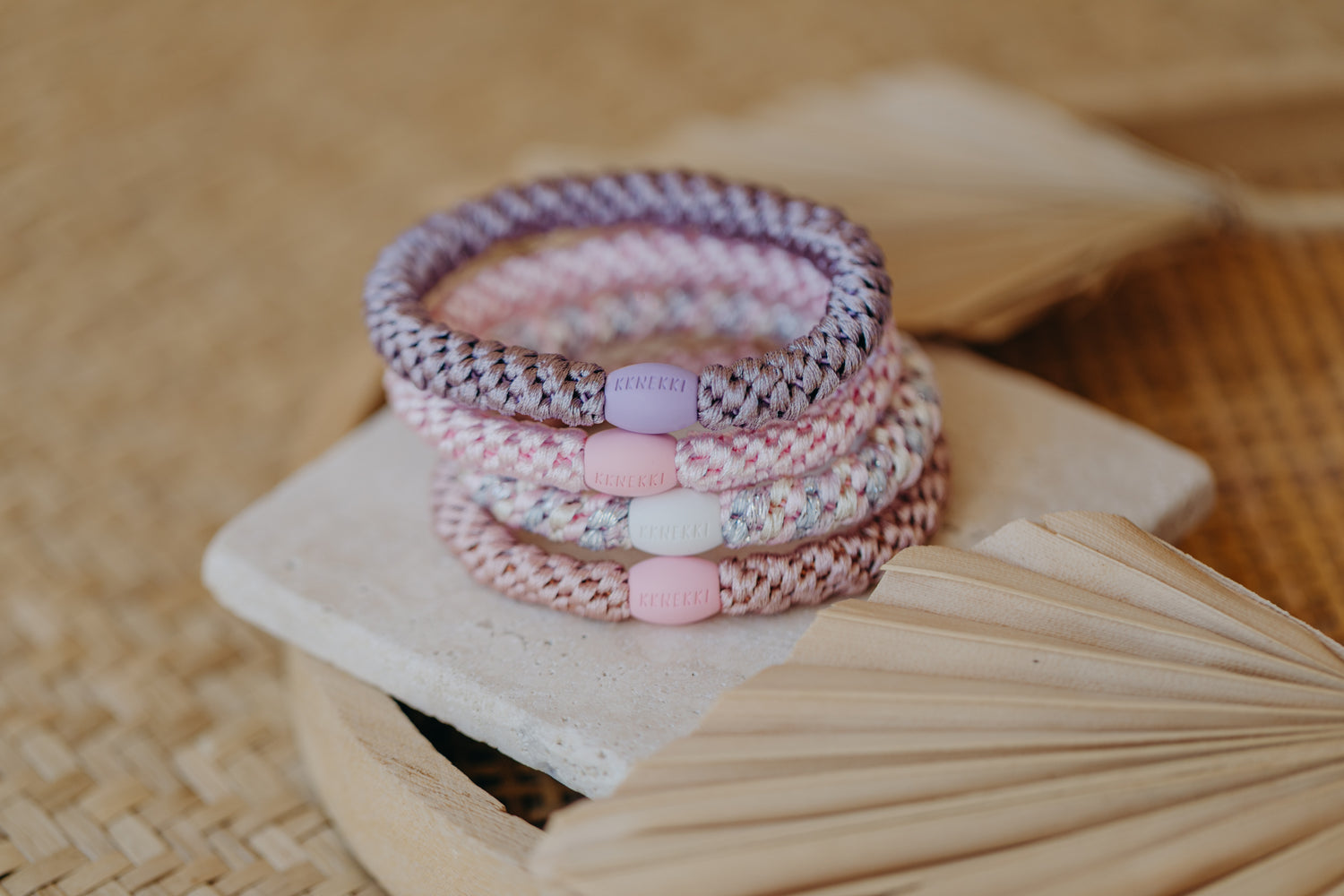 KKNEKKI hair tie set of 4 in shades of grey, green and black