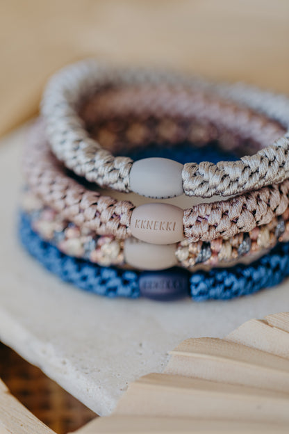 KKNEKKI hair tie set of 4 in shades of grey, green and black