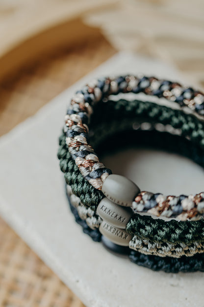 KKNEKKI hair tie set of 4 in shades of grey, green and black