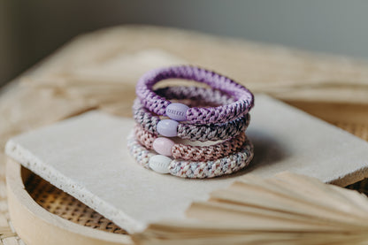 KKNEKKI hair tie set of 4 in shades of grey, green and black