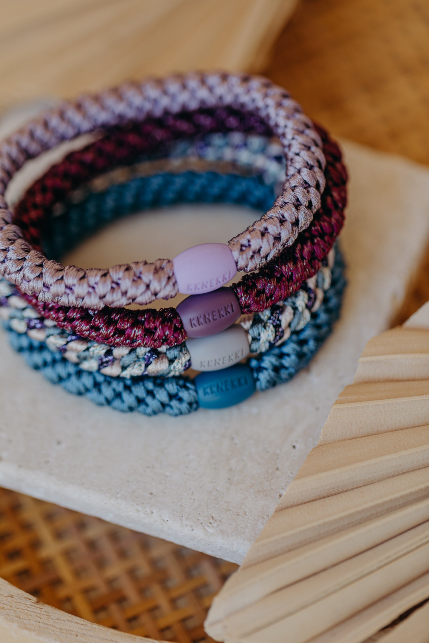 KKNEKKI hair tie set of 4 in shades of grey, green and black