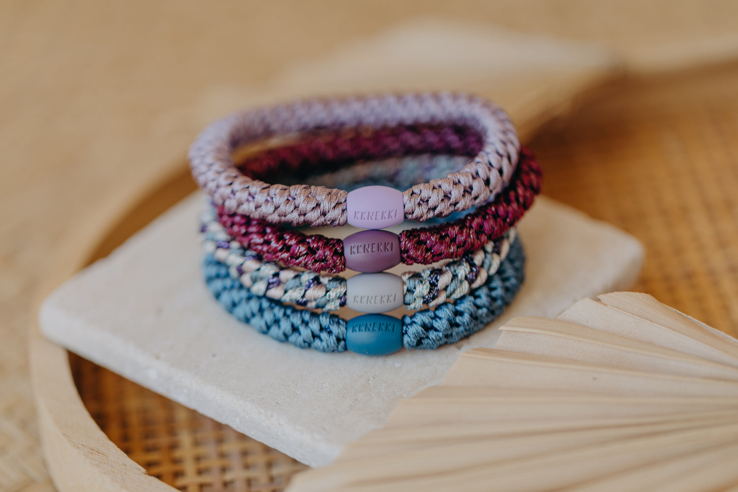 KKNEKKI hair tie set of 4 in shades of grey, green and black