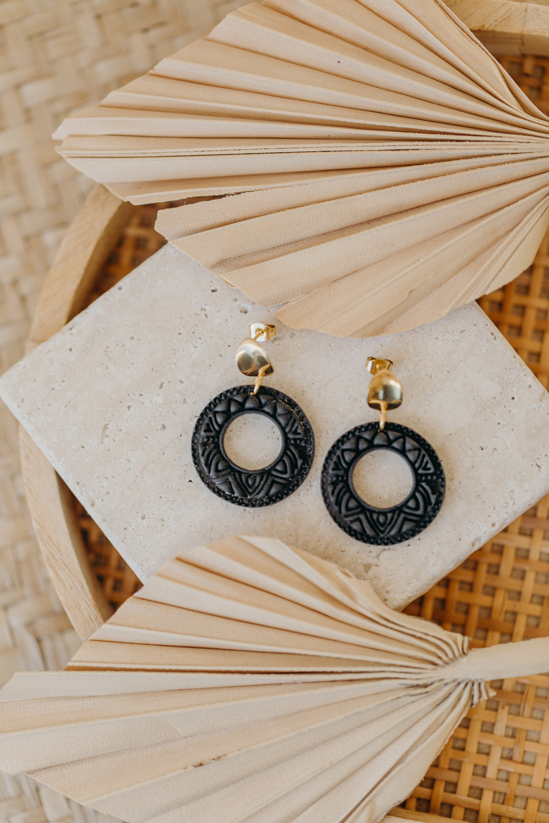 LEA - round patterned black polymer clay earrings