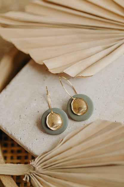 Hoop earrings with round polymer clay pendant and leaf