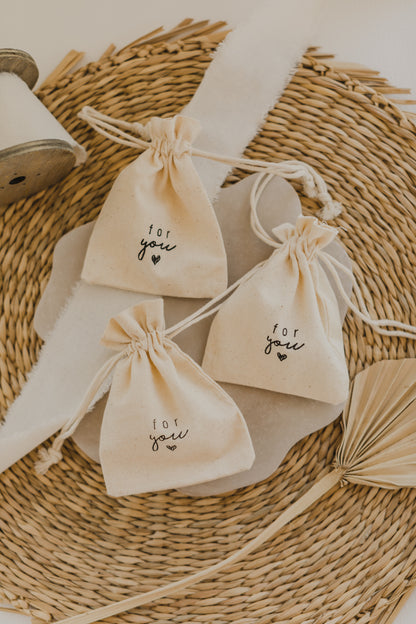 small golden paper bag with white dots