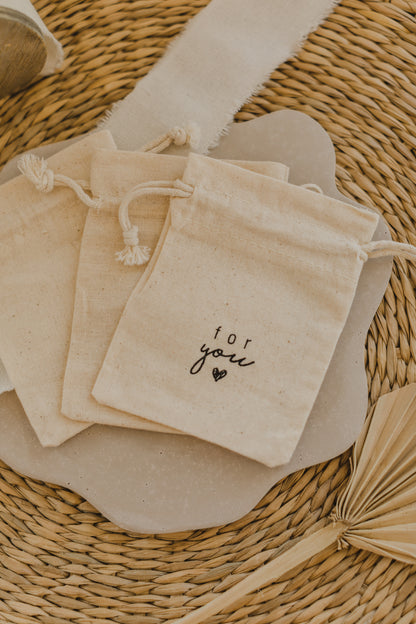 small golden paper bag with white dots