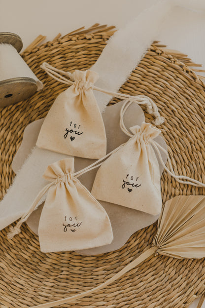 small golden paper bag with white dots