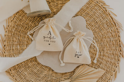 small golden paper bag with white dots