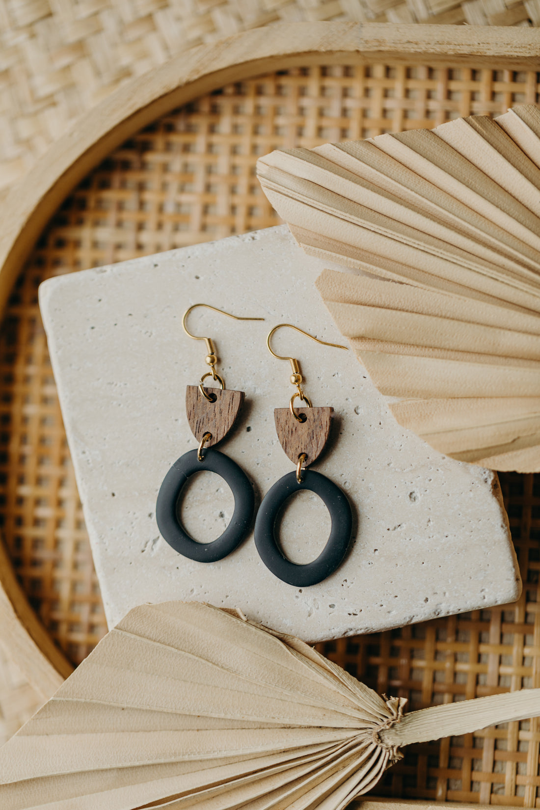 triangular polymer clay earrings in eucalyptus green with rectangular wooden pendant