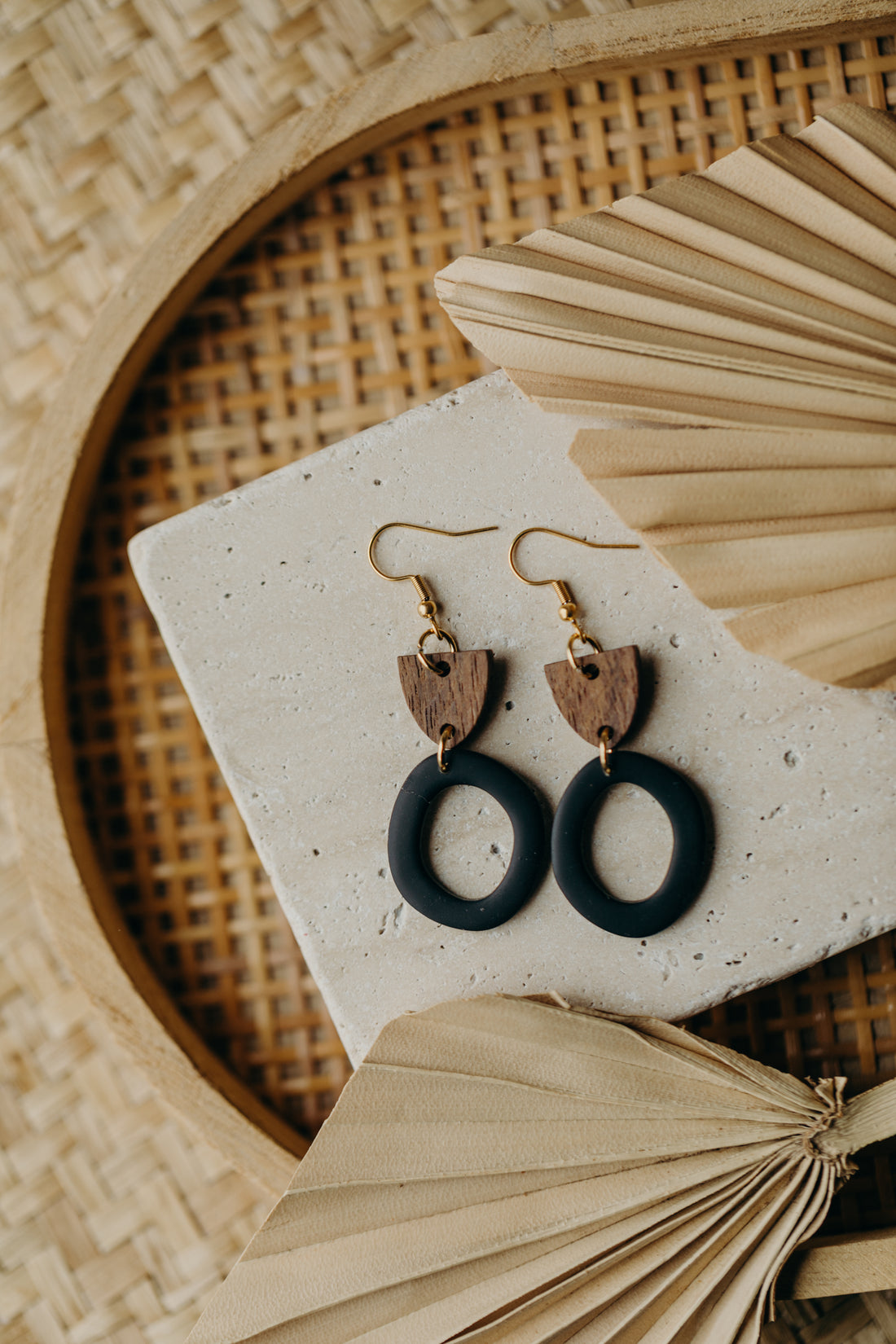triangular polymer clay earrings in eucalyptus green with rectangular wooden pendant
