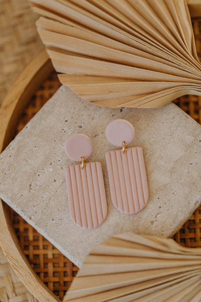 MOEMI - striped pink bow-shaped earrings