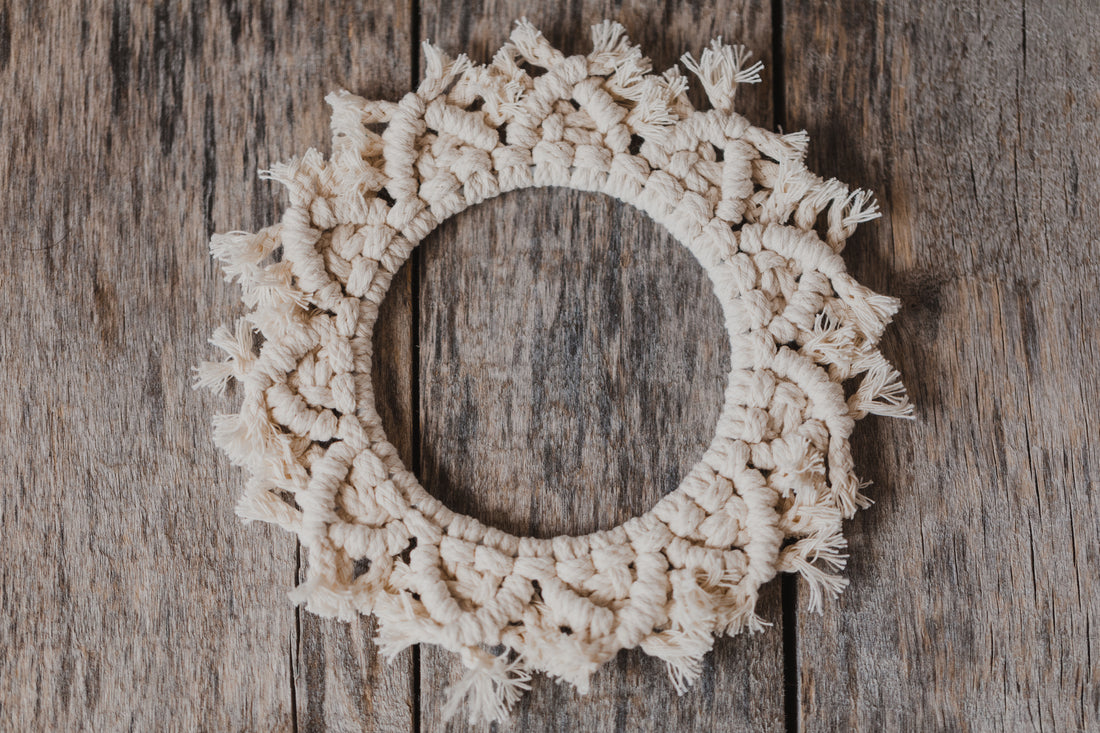 large macrame stars in the colors vanilla, pink and gray