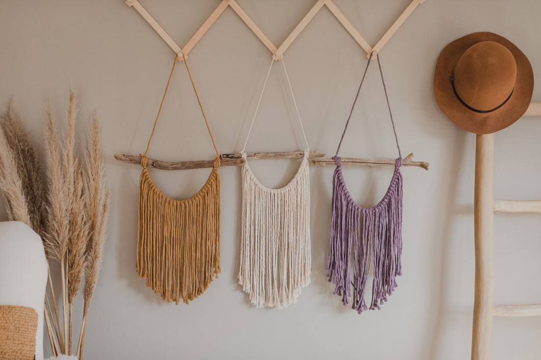 Macrame wall hanging in natural, yellow and purple colors