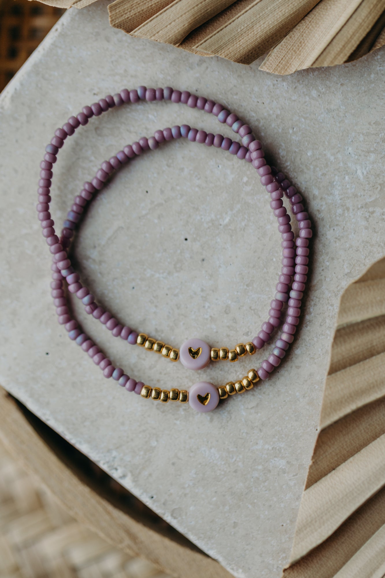 Herz Perlenarmband in flieder