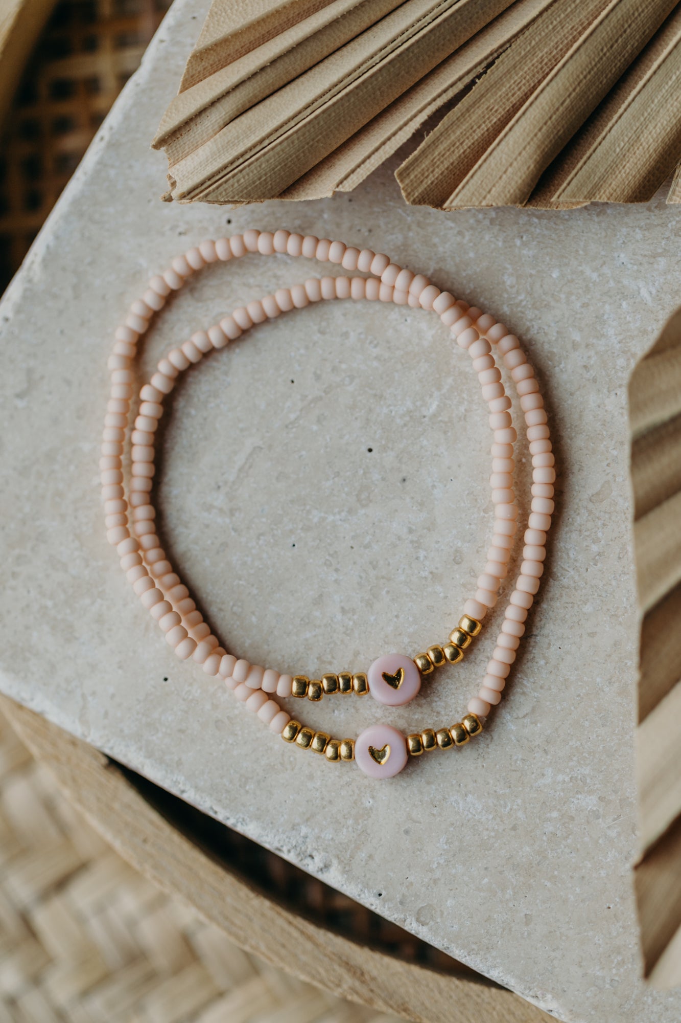 Herz Perlenarmband in apricot