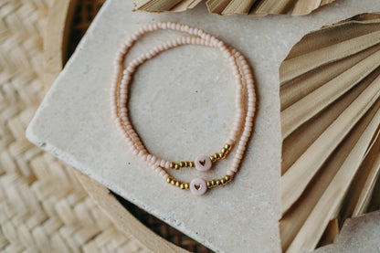 Herz Perlenarmband in apricot