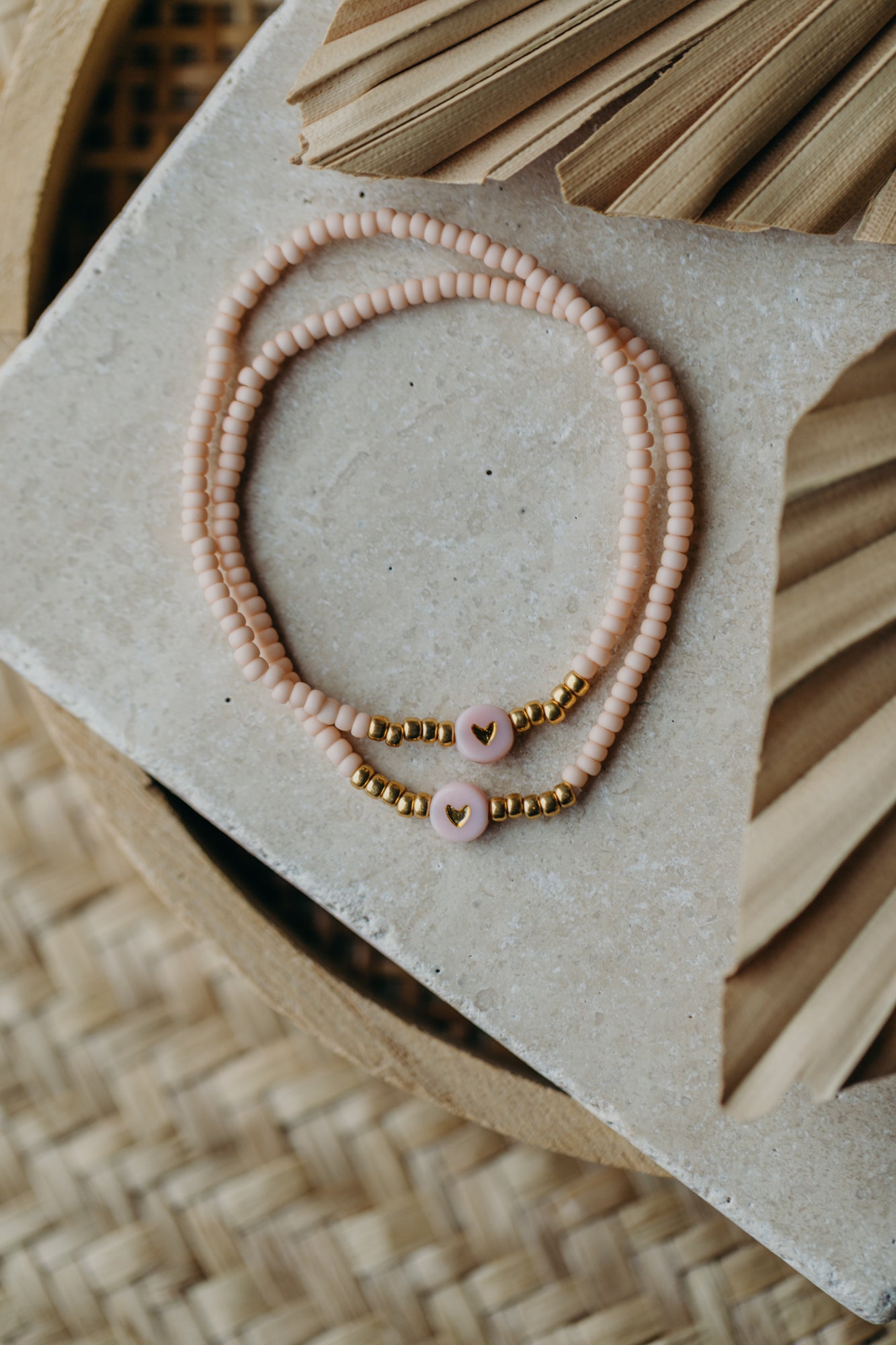 Herz Perlenarmband in apricot
