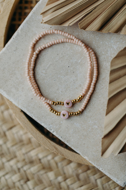 Herz Perlenarmband in apricot