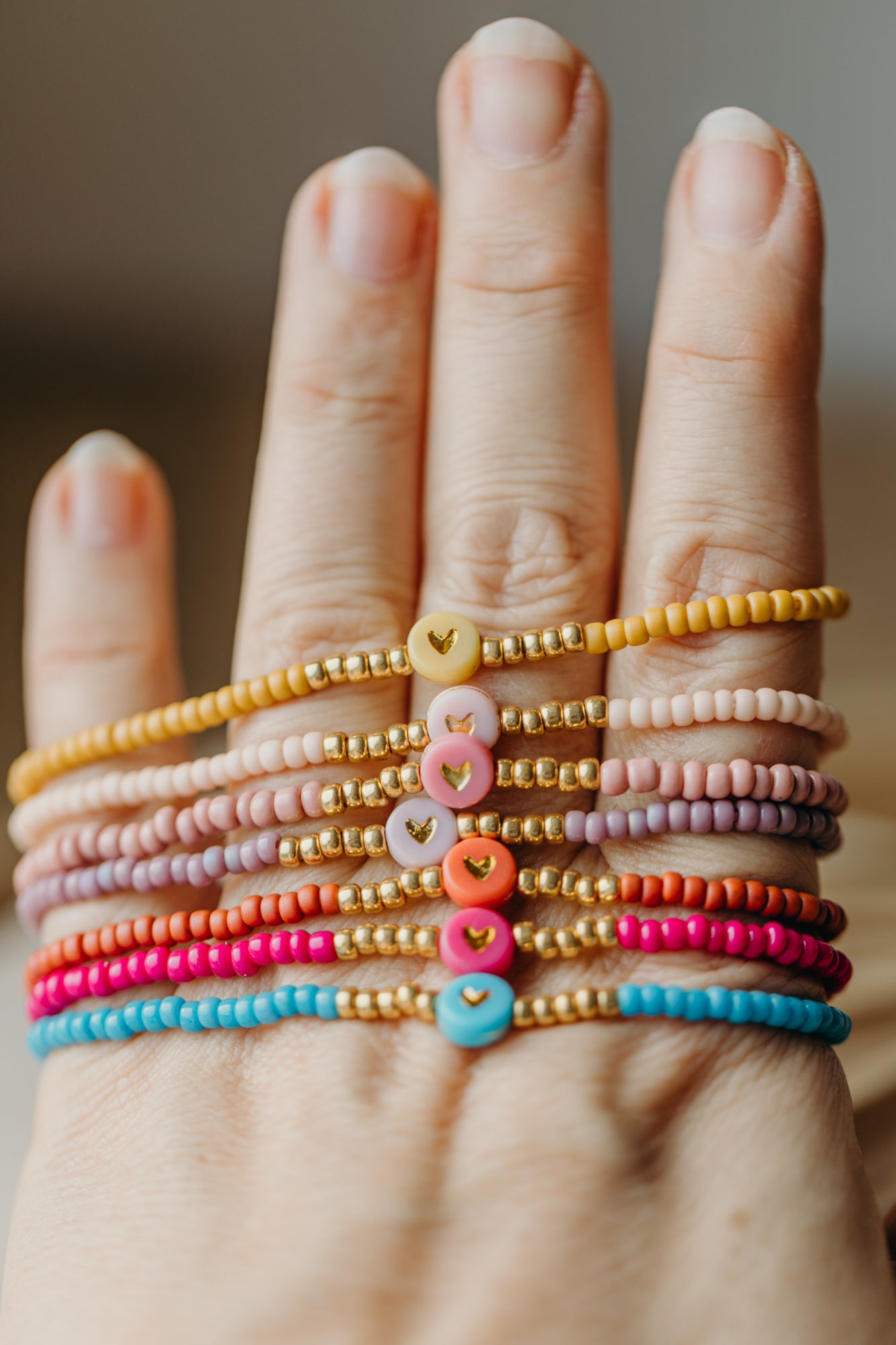 Herz Perlenarmband in senfgelb