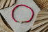 weiß-goldenes Herz Perlenarmband in pink