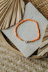 weiß-goldenes Herz Perlenarmband in orange