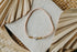 weiß-goldenes Herz Perlenarmband in apricot
