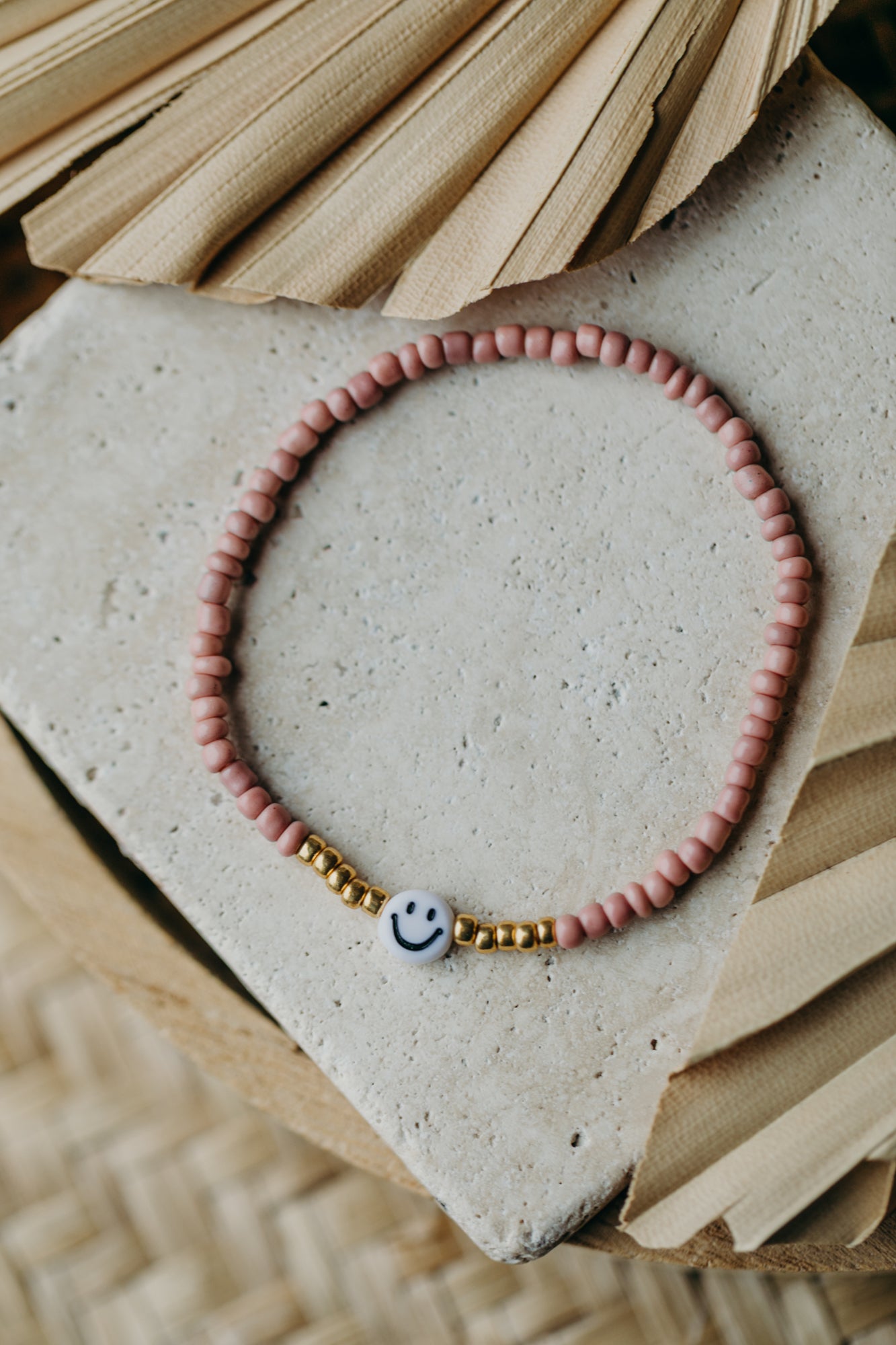 Smiley Perlenarmband in Mauve