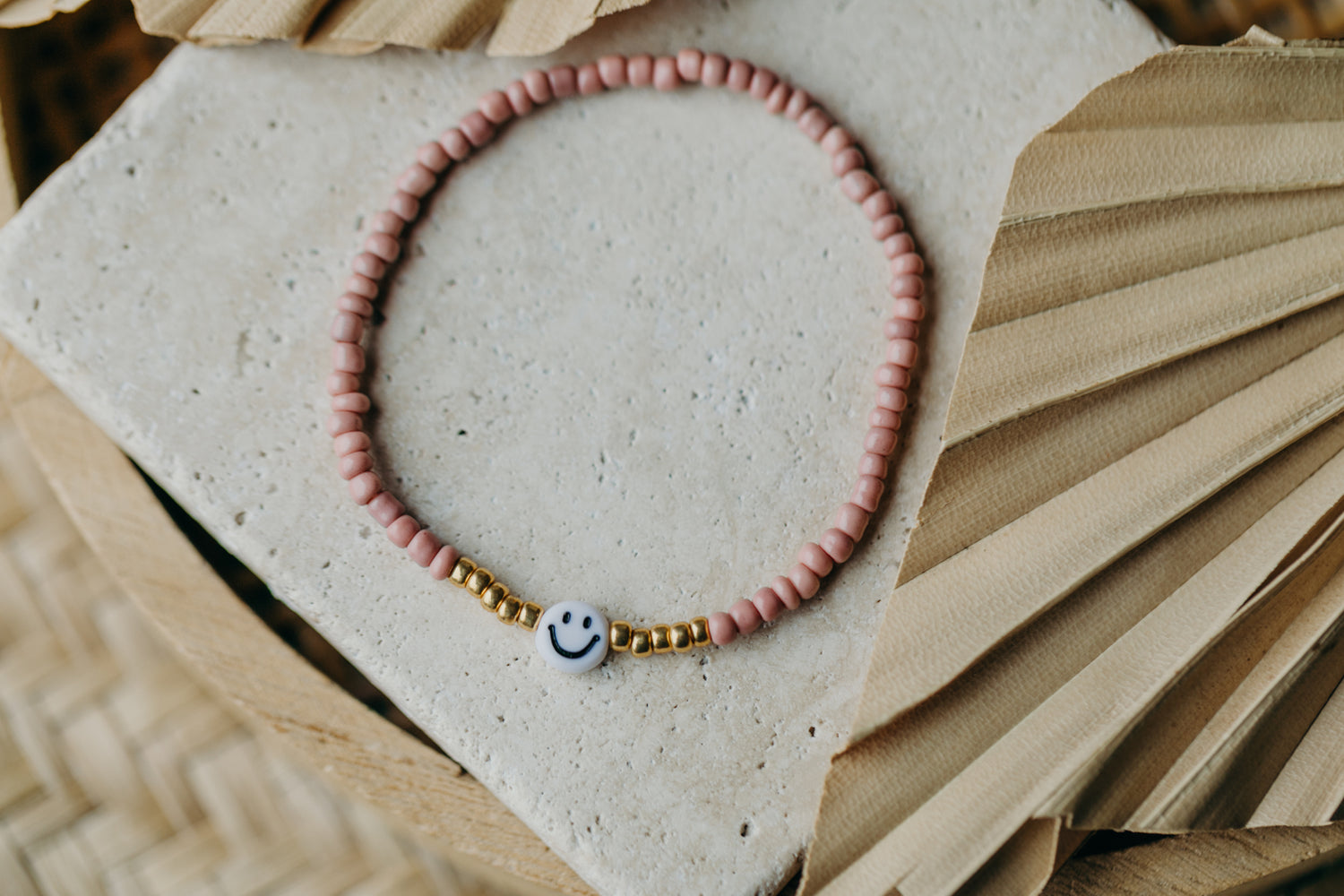 Smiley Perlenarmband in Mauve