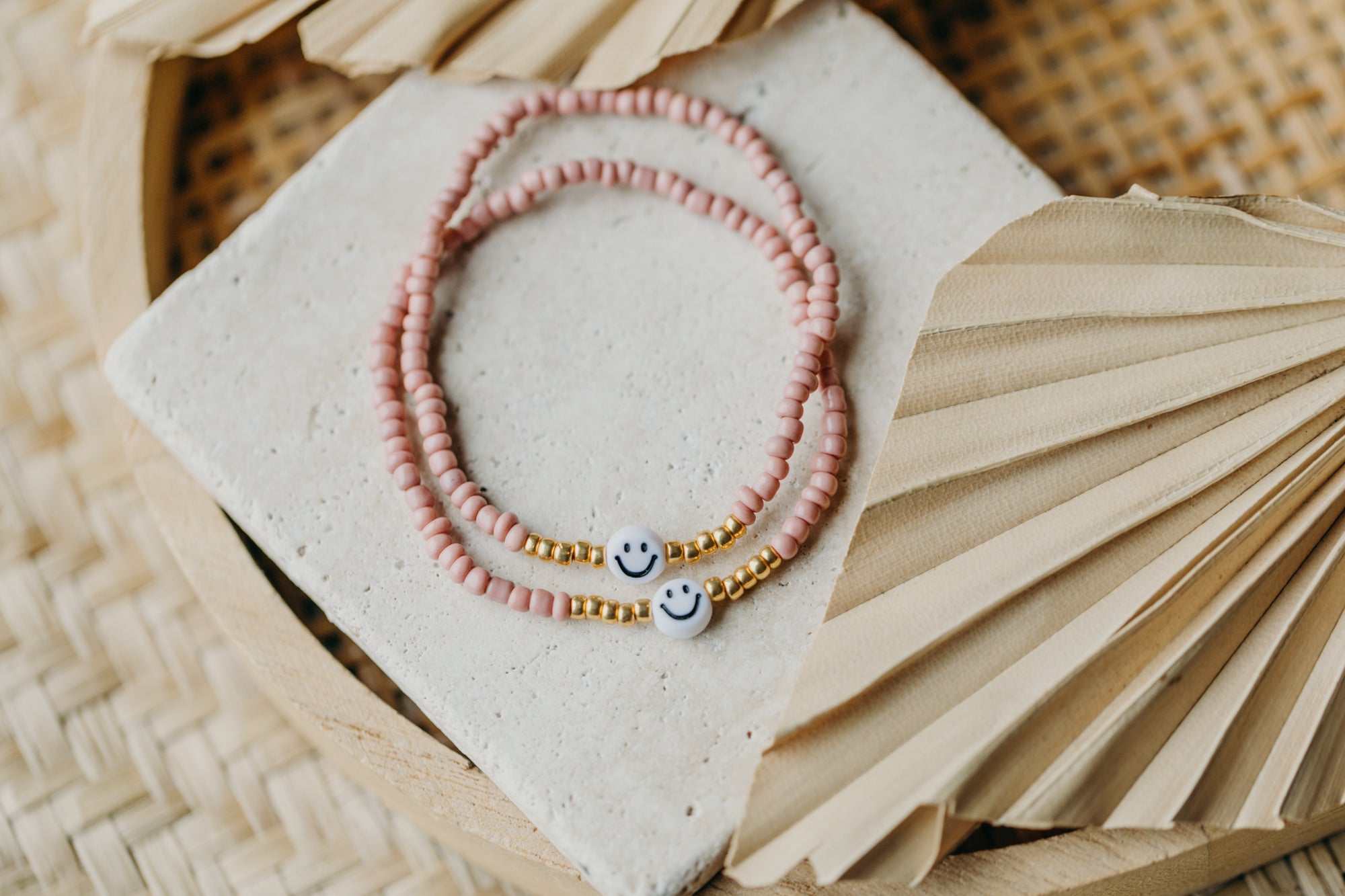 Smiley Perlenarmband in Mauve