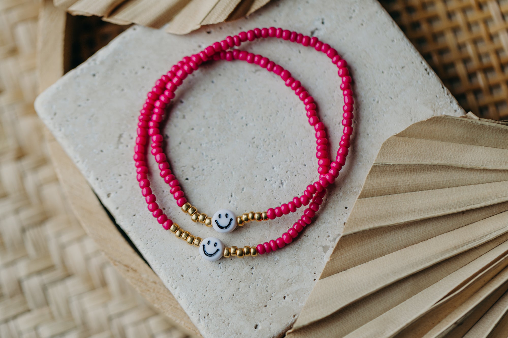 Smiley Perlenarmband in Pink