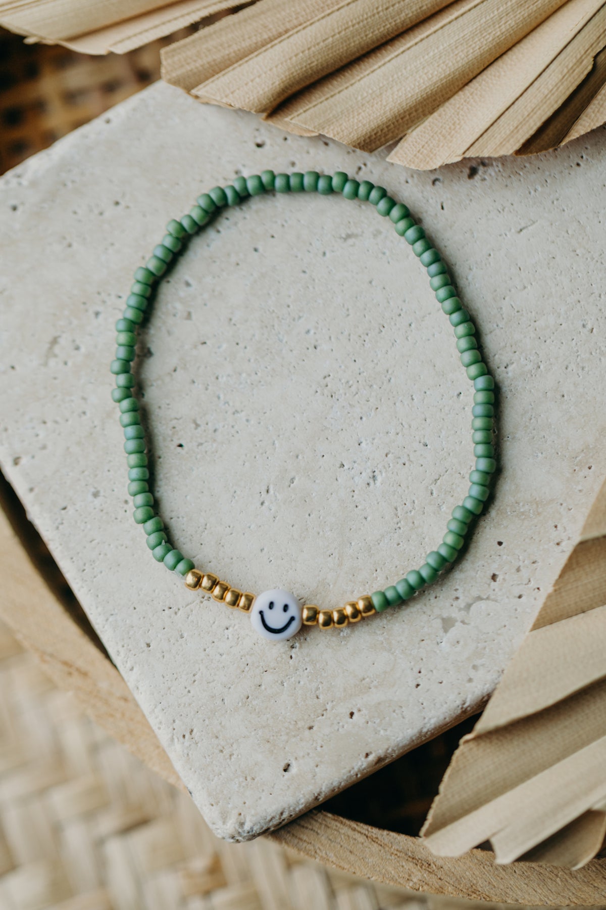 Smiley Perlenarmband in Grün