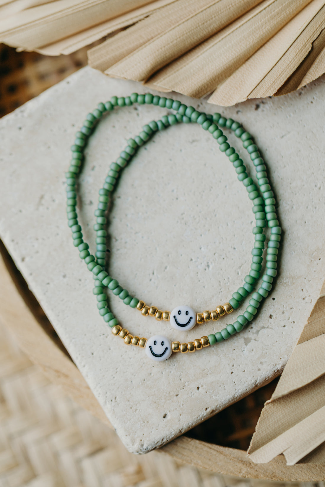 Smiley Perlenarmband in Grün