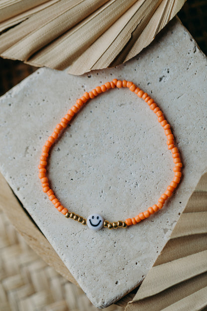 Smiley Perlenarmband in Orange