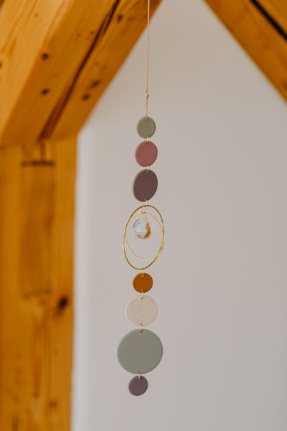 Suncatcher with dots cream, purple, brown and green 