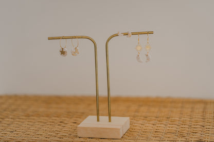 Hoop earrings with round polymer clay pendant and leaf