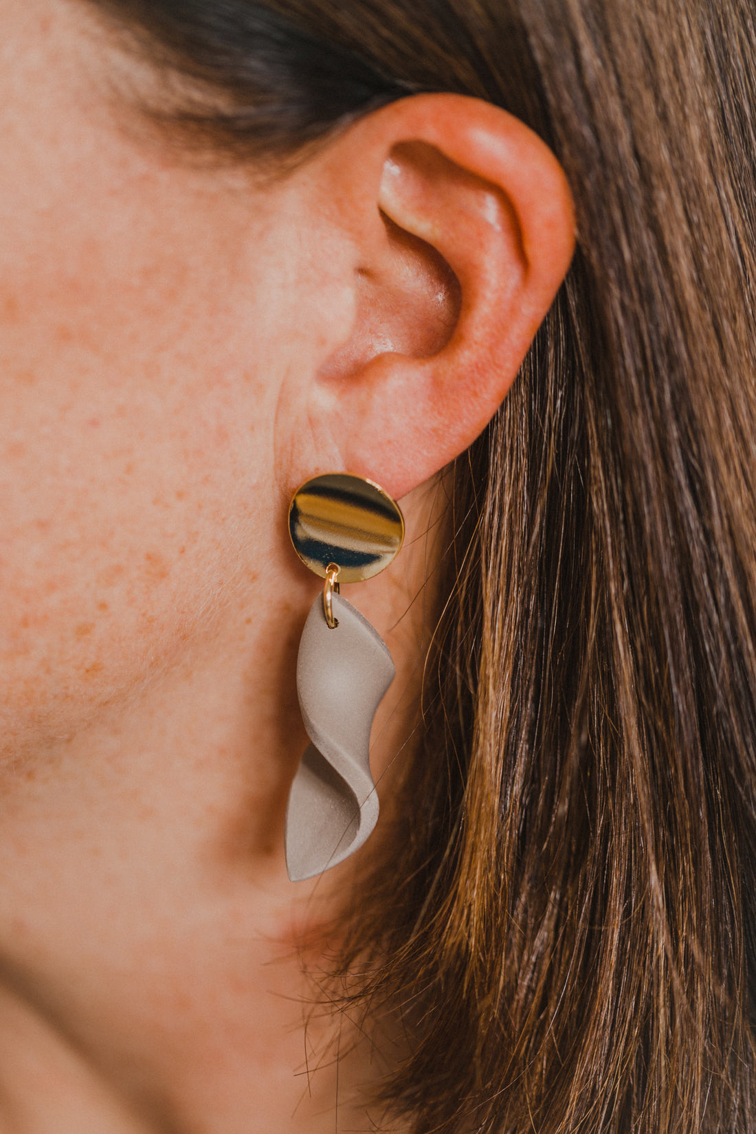 Hoop earrings with round polymer clay pendant and leaf