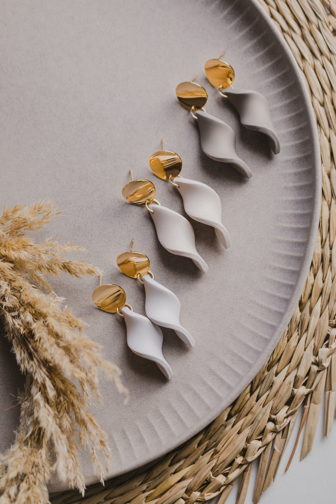 Hoop earrings with round polymer clay pendant and leaf