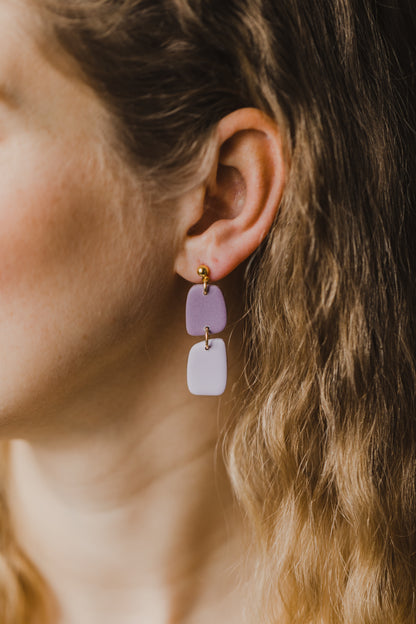 two-tone earrings made of polymer clay in pastel colors